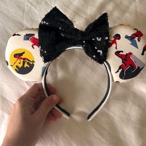 Disney Minnie ears. Vintage Incredibles print with black sequin bow.
